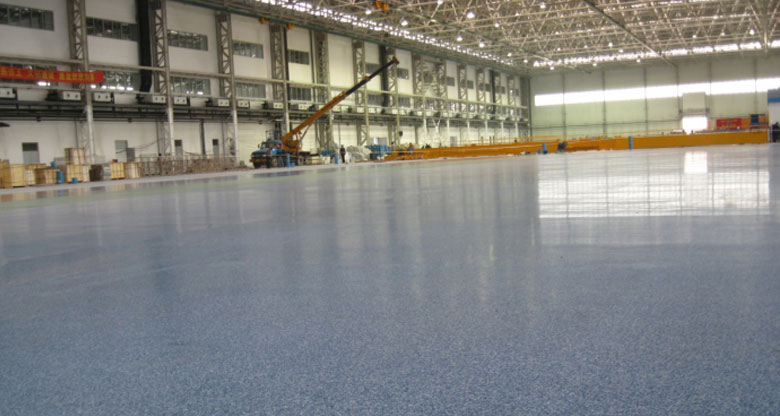 北京航特承接沈陽沈飛工業(yè)集團有限公司總裝廠房環(huán)氧彩砂地面工程